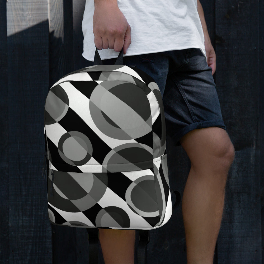 a woman standing next to a large soccer ball