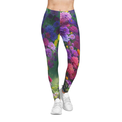 Midnight Garden women’s casual leggings with a bold all-over floral print in purple, pink, red, yellow, and green on a dreamy gradient background. Artistic, stylish, and perfect for yoga, casual wear, or standout fashion.