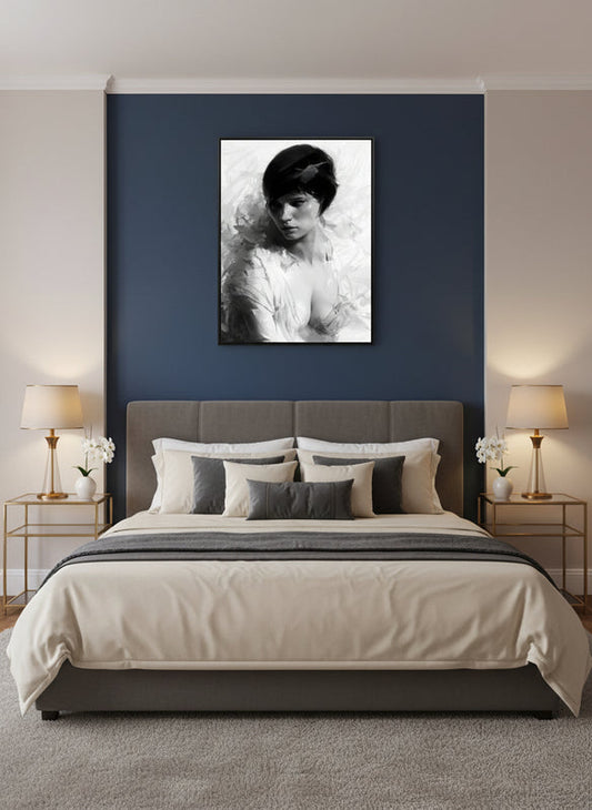 Framed black and white Art Deco portrait displayed above a luxury bed against a Prussian blue accent wall, with warm ambient lighting, gold bedside lamps, neutral bedding and soft textures, creating a refined modern bedroom where the grayscale artwork becomes the dramatic focal point.