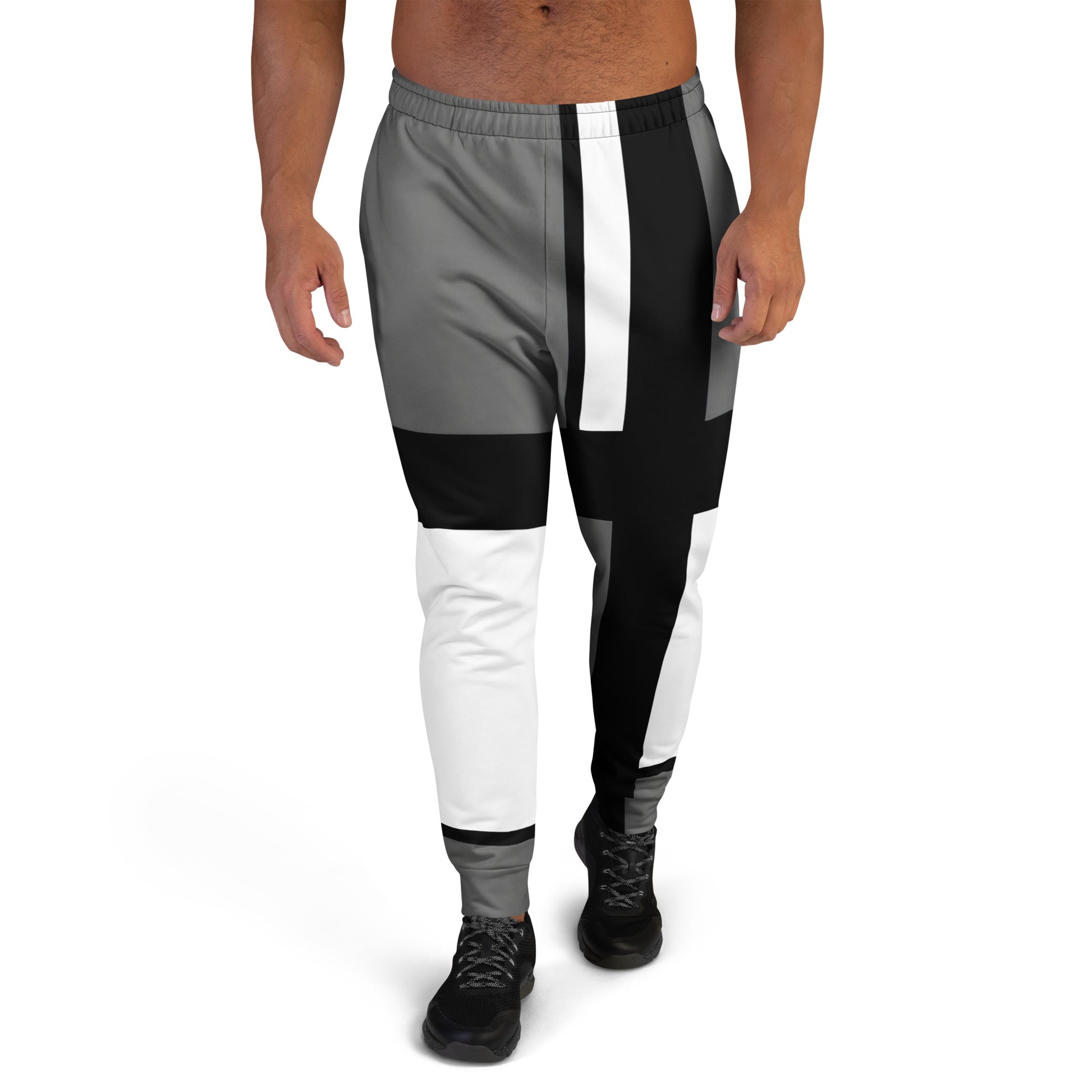 Men’s joggers featuring 60s 2 geometric retro design in black, white, and grey. Cotton-feel fabric with brushed fleece inside. Comfortable casual pants for workouts, lounging, or modern streetwear.