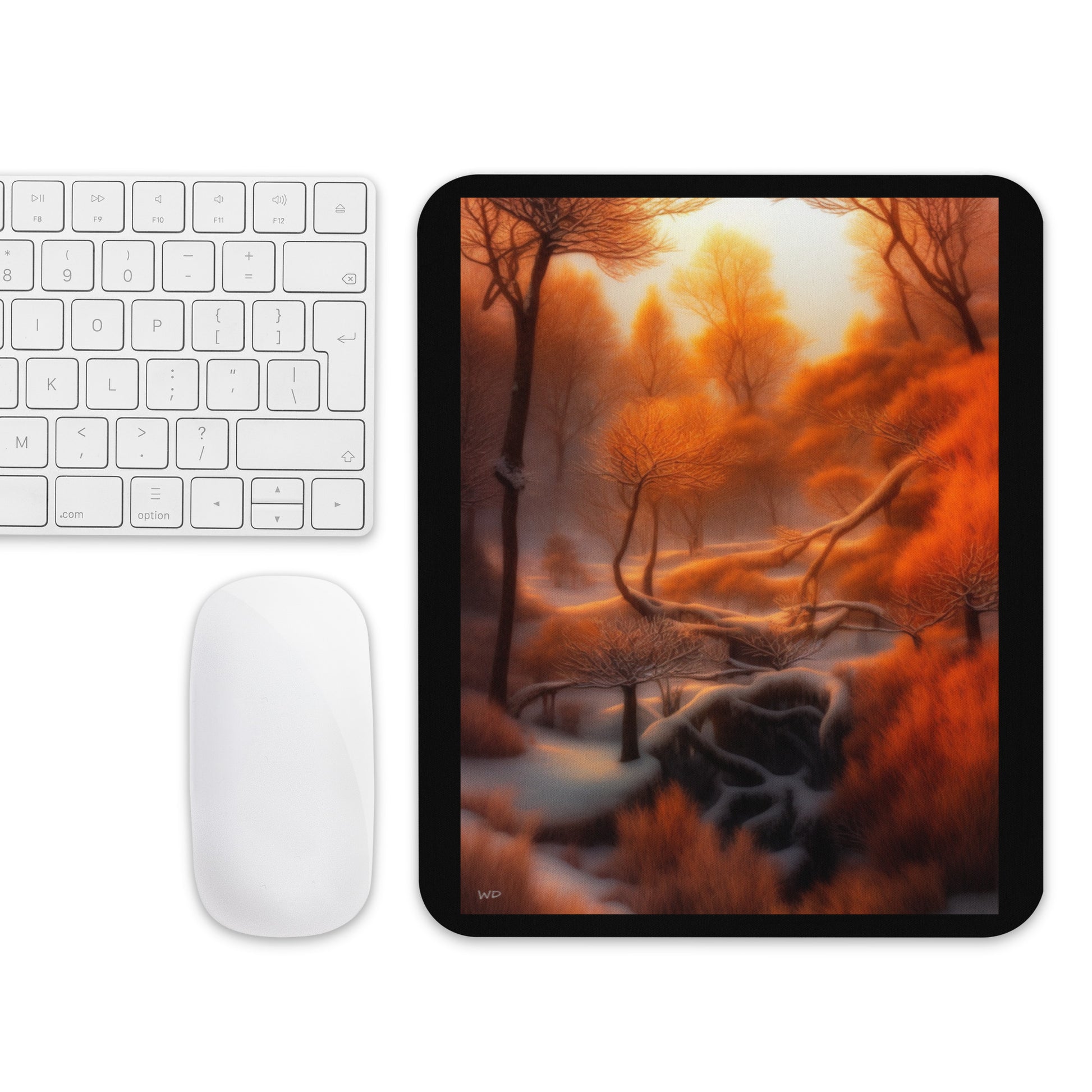 Mouse pad featuring a fantasy art landscape of a golden winter forest with amber trees, snow-covered branches, and soft sunlight — a warm, peaceful desk accessory for creative spaces.