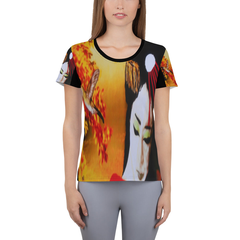 Women’s athletic t-shirt featuring a Japanese woman in traditional makeup with closed eyes, autumn leaves, and a small bird, set against a warm orange and red seasonal background.