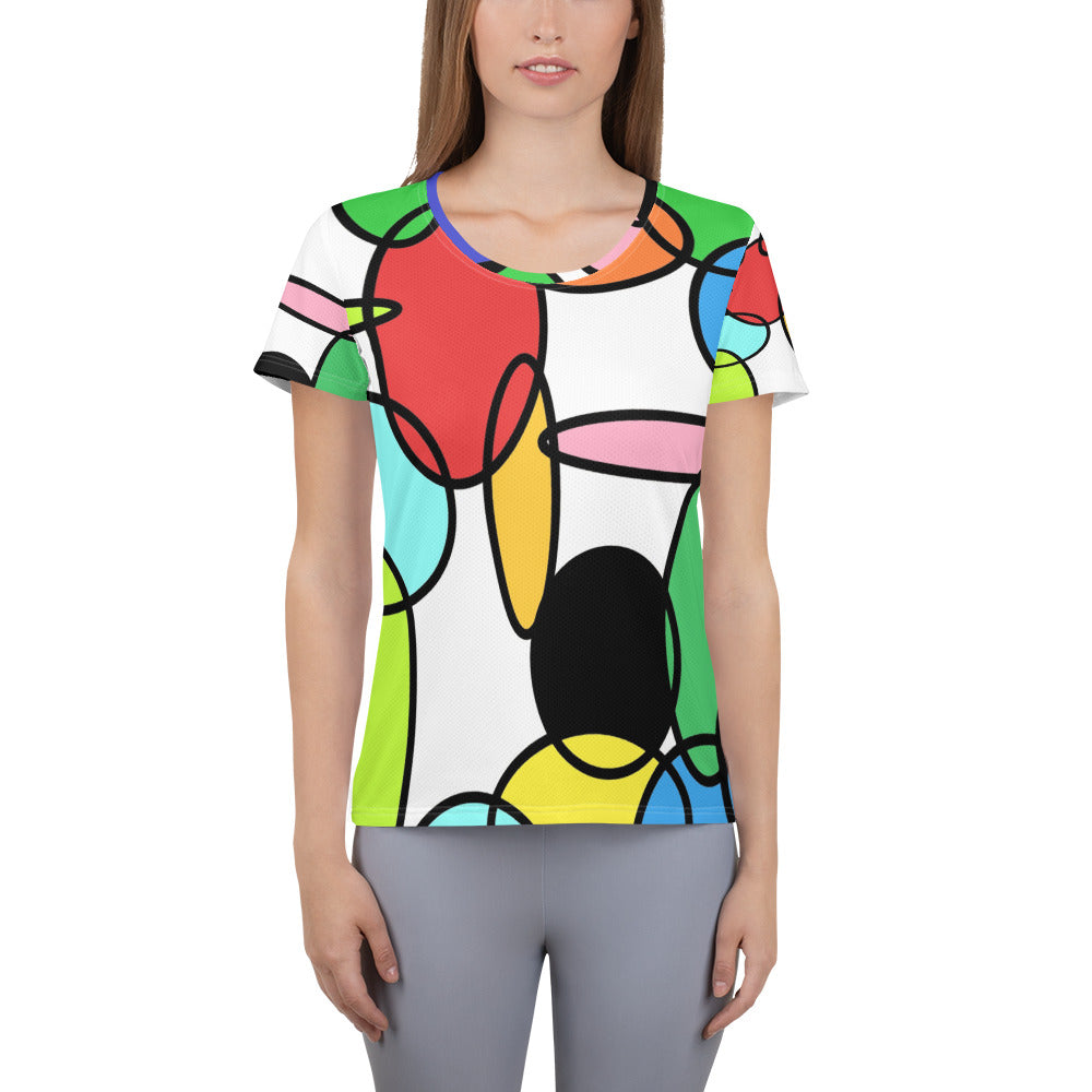 Women’s athletic t-shirt with colorful abstract chain design inspired by retro 60s and 70s style, featuring vibrant loops in red, green, yellow, pink, blue, and black on a white base.