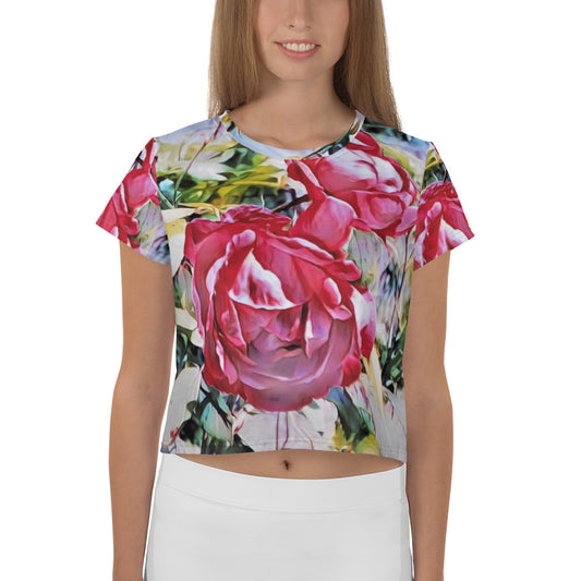 All-Over Print Crop Tee featuring vibrant red and pink roses under summer light. French Design inspired by nature and floral art, perfect for home, office, or creative studio wear.