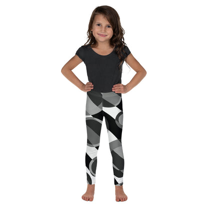 Kids leggings “Bubble 2” featuring a black and white geometric abstract design inspired by 60s-70s retro style.