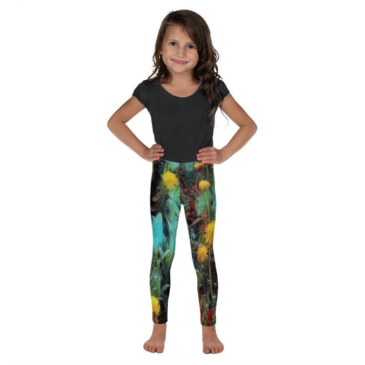Kids leggings “Wild Garden” with colorful dandelions and wildflowers in a lush natural landscape, inspired by untamed nature.