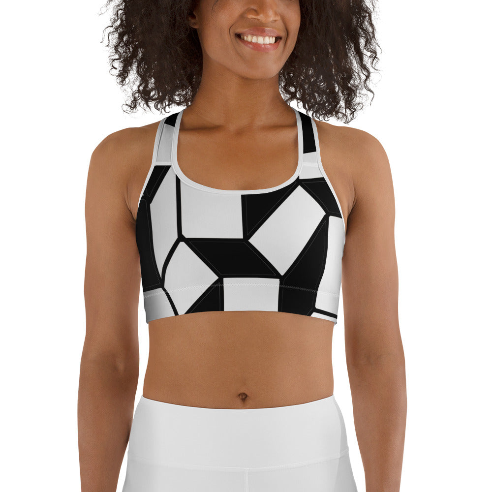 Black and white geometric sports bra with retro 60s design and French artistic flair