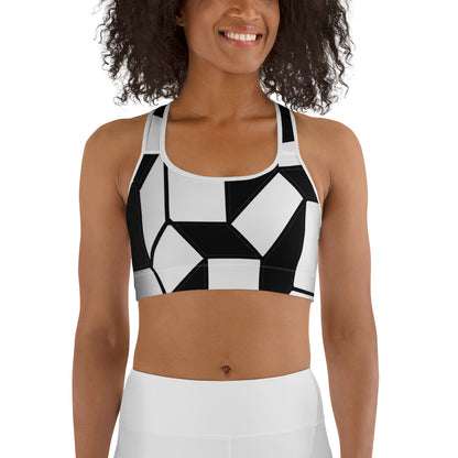 Black and white geometric sports bra with retro 60s design and French artistic flair