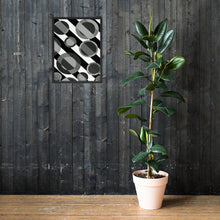 Load image into Gallery viewer, a potted plant sitting on a wooden table 