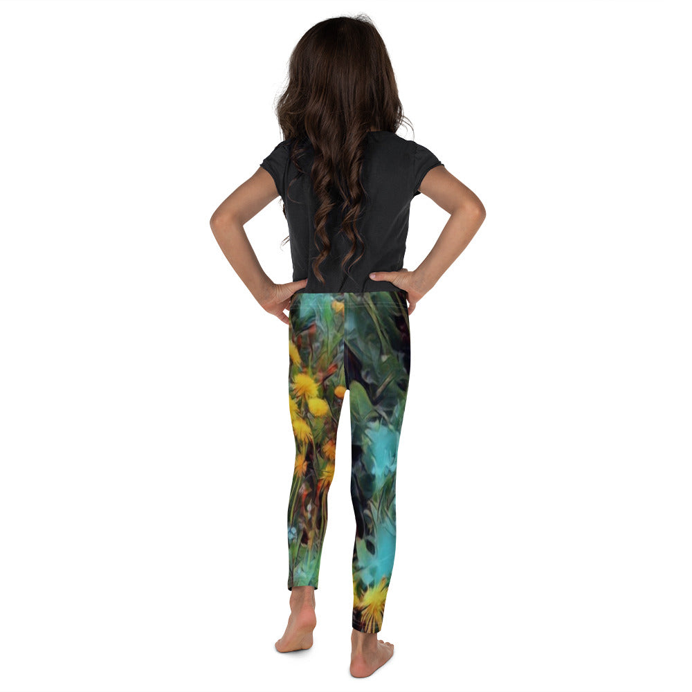 a woman holding a skateboard on a wall 